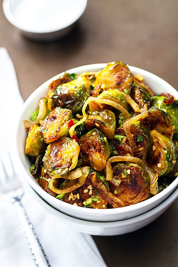 These sweet and spicy brussels sprouts caramelized at the perfection will enhance any of your main dishes. eatwell101.com