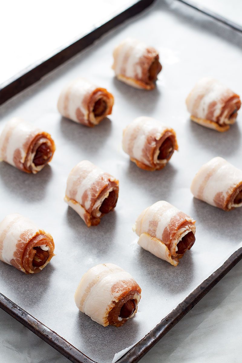 These Cheesy Bacon Wrapped Dates are so easy to throw together and the combination of crispy bacon with naturally sweet dates and creamy cheese in the middle is irresistible!