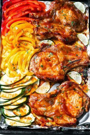 Baked BBQ Pork Chops with Zucchini and Peppers