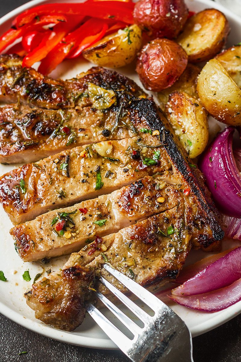 Sheet Pan Pork Chops in Oven — A quick and easy sheet pan dinner you can whip up in a breeze.