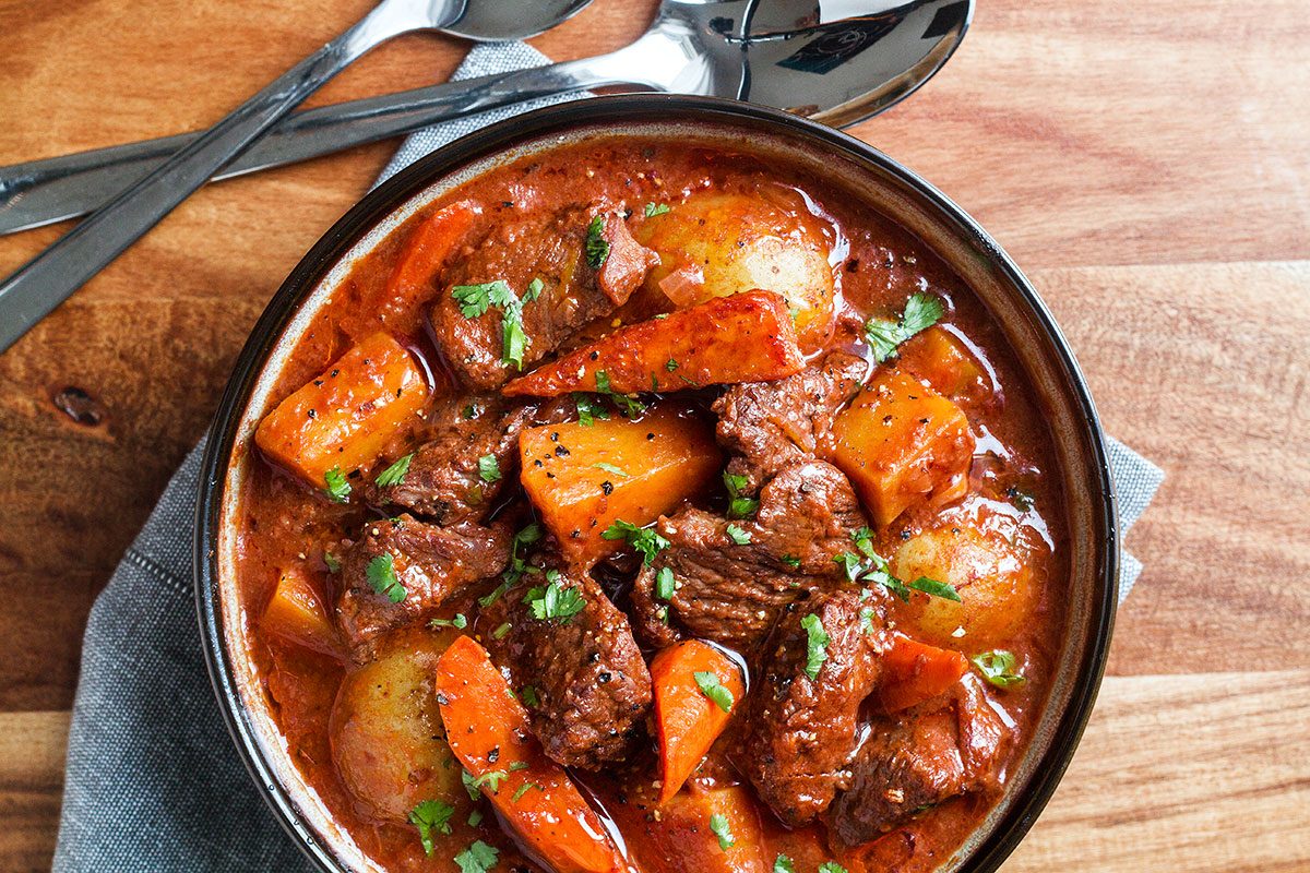 Slow Cooker Beef Stew — A hearty and delicious beef stew that is loaded with hearty veggies and incredible flavor!