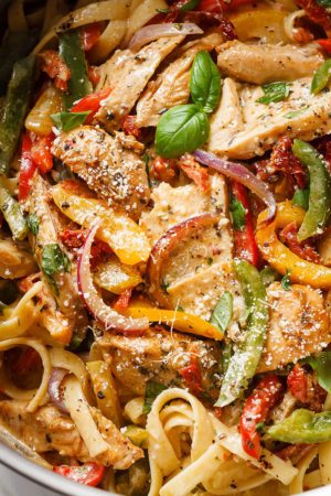 Chicken Pasta in Creamy Pesto Sun-Dried Tomato Sauce
