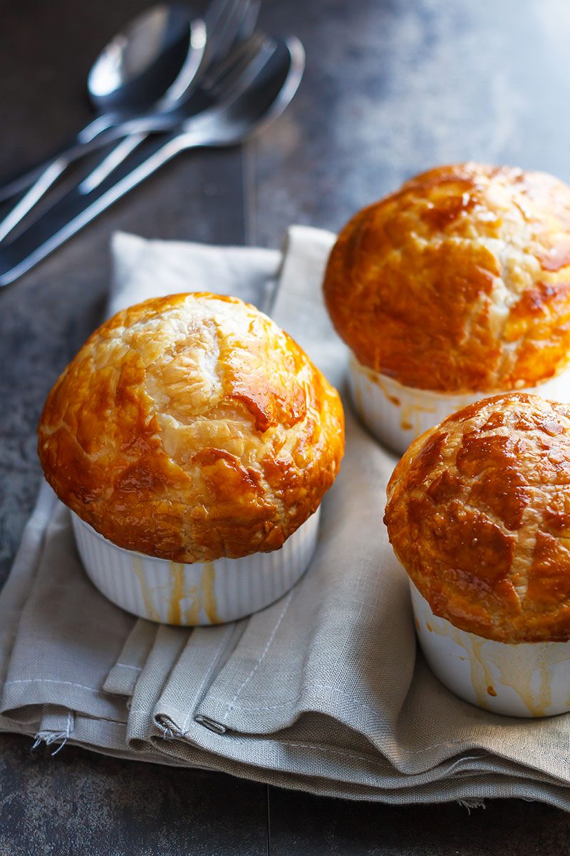 Creamy Chicken Pot Pie - Rich, flavorful with a golden brown crispy crust, these individual chicken pot pies are seriously comforting.