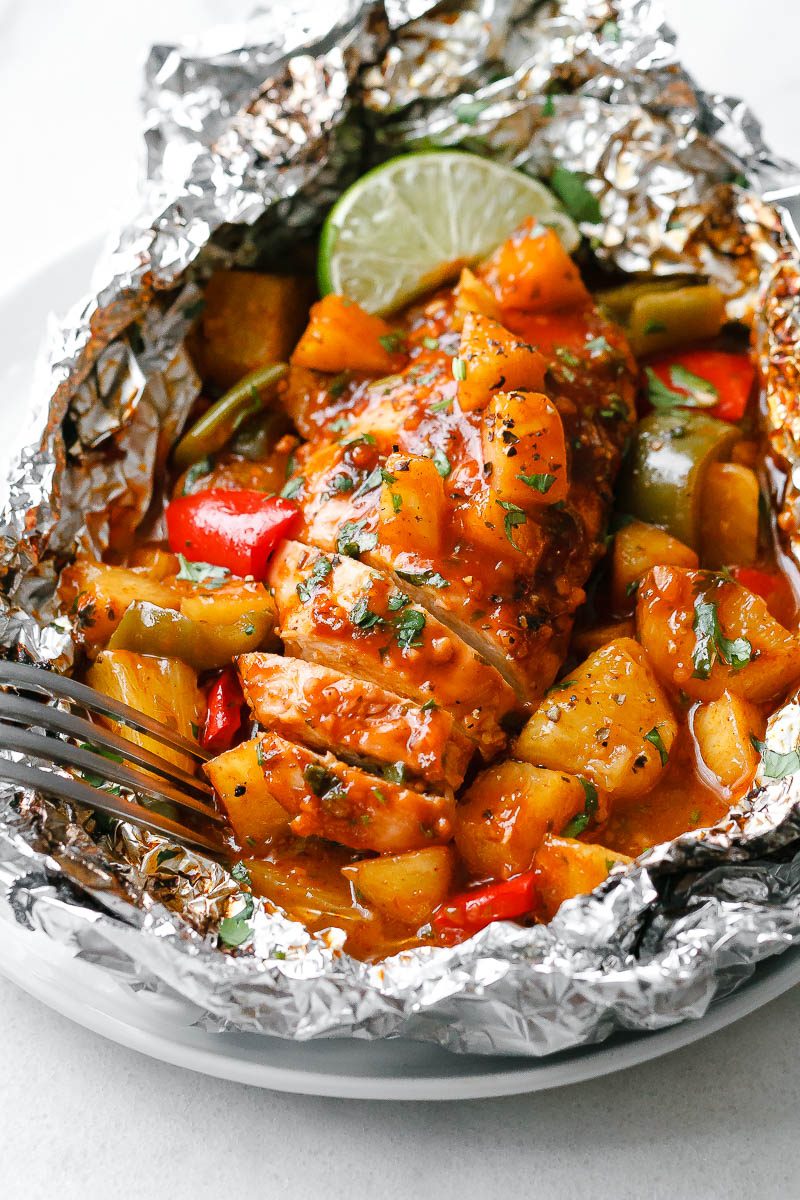 Pineapple baked Chicken Foil Packets in Oven - So easy and packed with tons of flavor. You’ll love the simplicity!