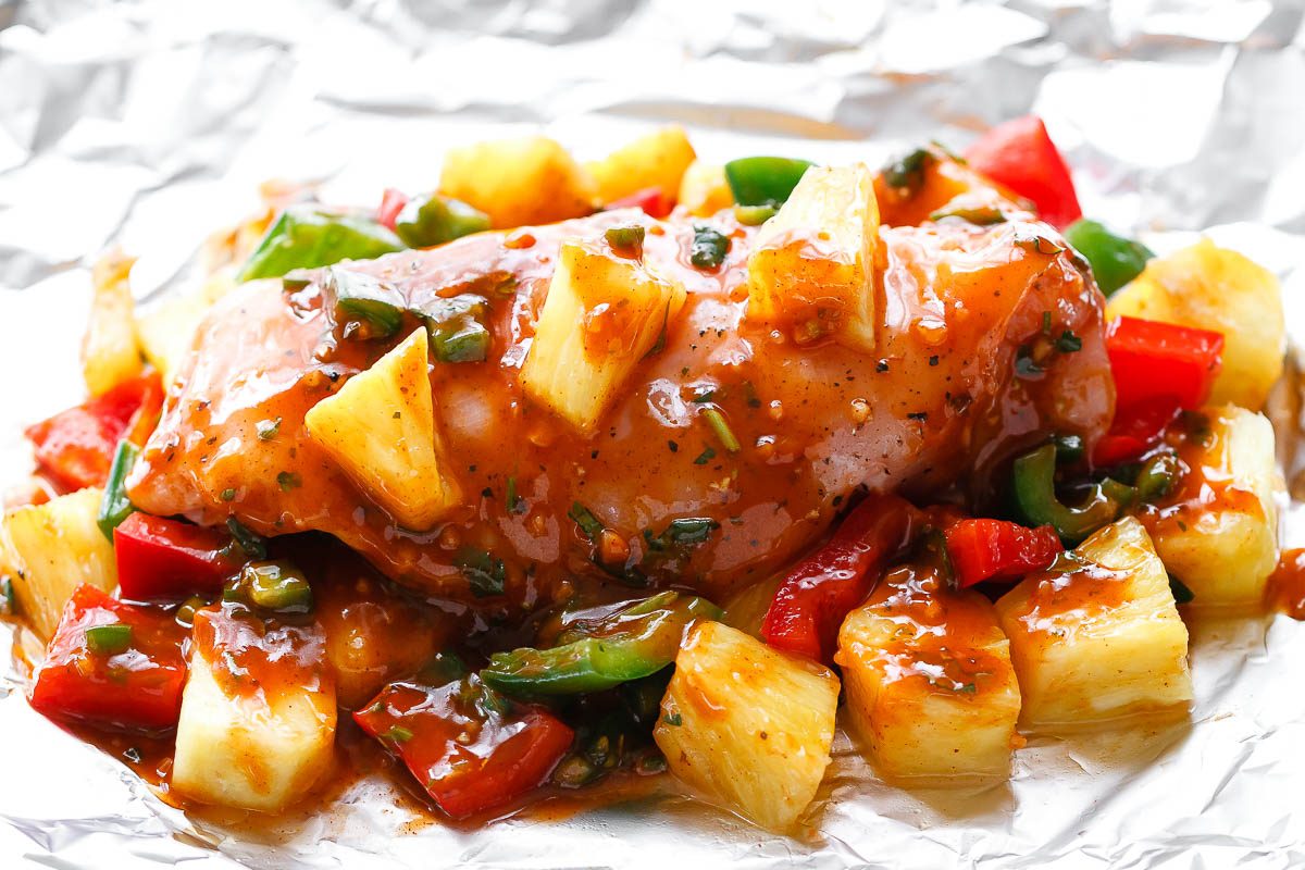 Pineapple BBQ Chicken Foil Packets in Oven - So easy and packed with tons of flavor. You’ll love the simplicity!