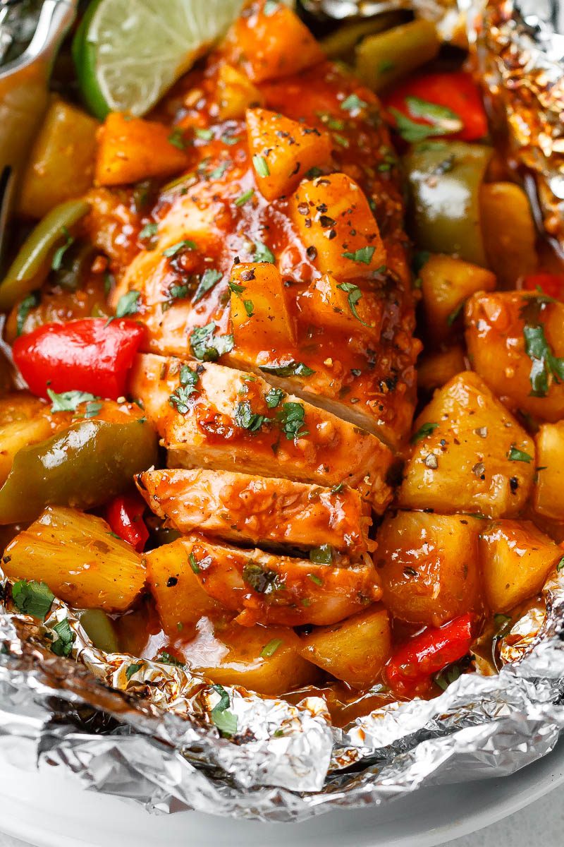 Pineapple BBQ Chicken Foil Packets in Oven - So easy and packed with tons of flavor. You’ll love the simplicity!