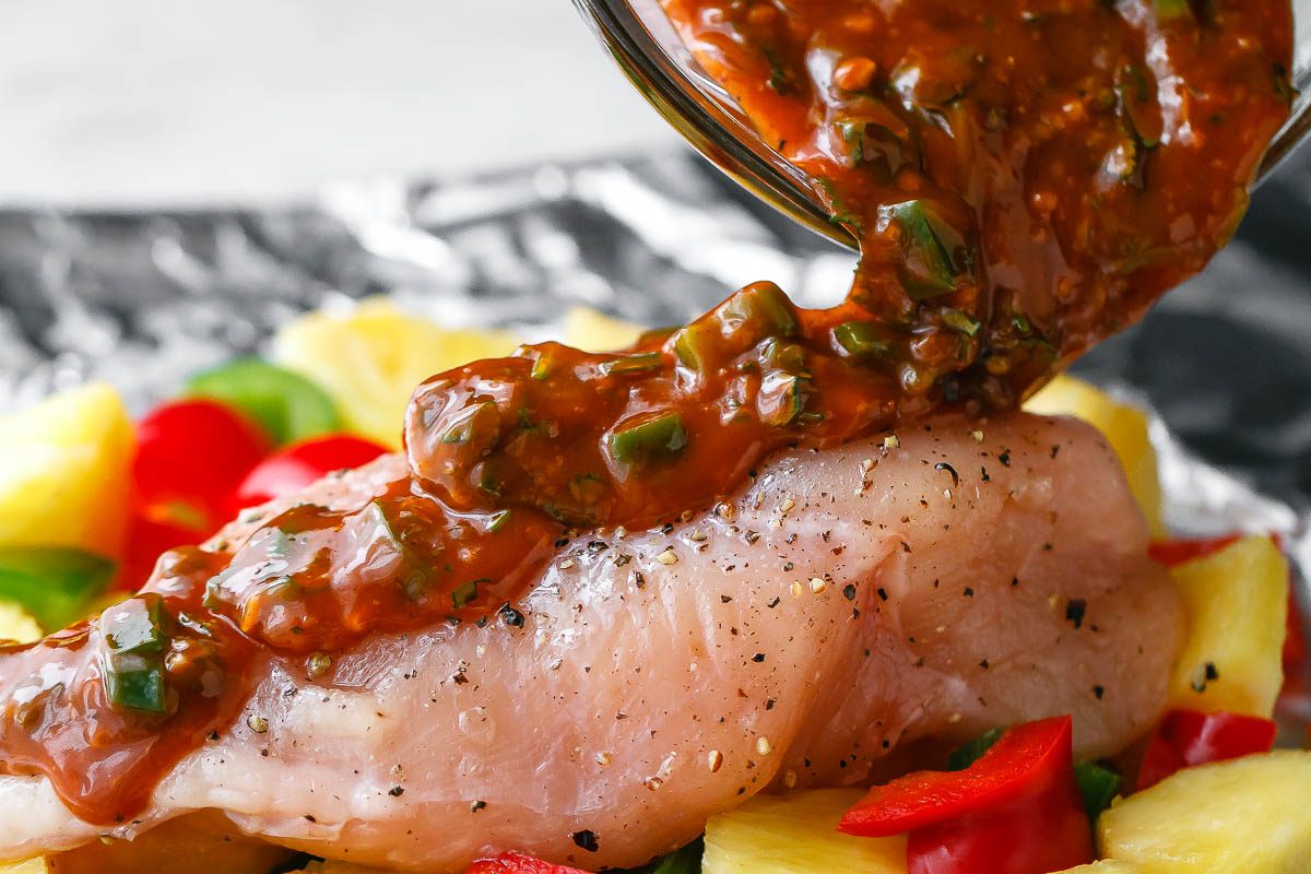 Pineapple BBQ Chicken Foil Packets in Oven - So easy and packed with tons of flavor. You’ll love the simplicity!