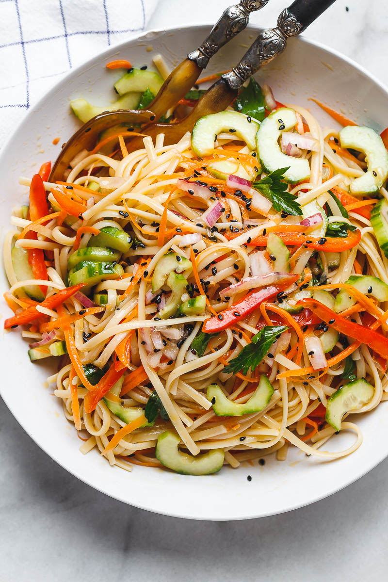 Asian Noodle Salad - With the Best Ever Ginger Vinaigrette. This vegan make-ahead salad is loaded up with healthy veggies and perfect for midweek lunches or larger gatherings.