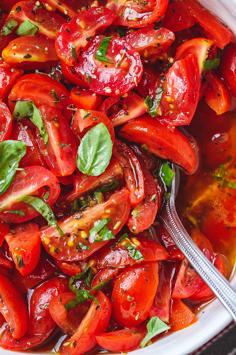 Marinated Cherry Tomato Salad - Really, reeeeeeally delicious! A super simple tomato salad with a punch of flavor.