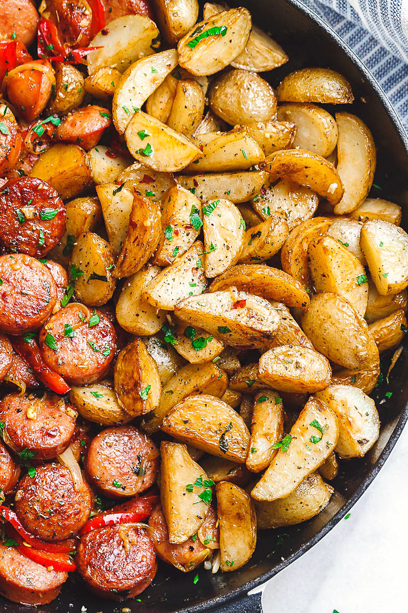 Smoked Sausage and Potato Skillet - Sizzle up a skillet full of delicious goodness with smoked sausage, potatoes, and bell peppers!