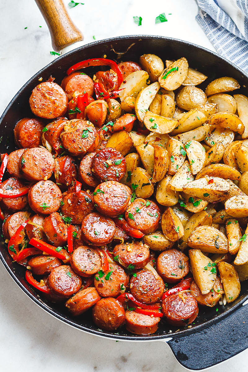 Smoked Sausage and Potato Skillet - Sizzle up a skillet full of delicious goodness with smoked sausage, potatoes, and bell peppers! 