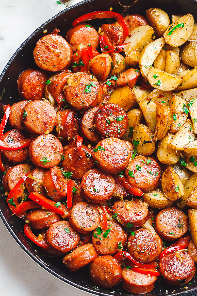 Smoked Sausage and Potato Skillet - Sizzle up a skillet full of delicious goodness with smoked sausage, potatoes, and bell peppers!