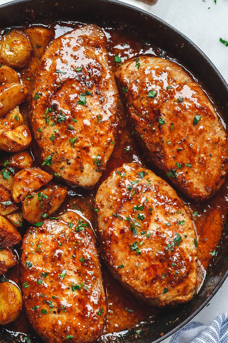 Honey Mustard Pork Chops and #Potatoes Skillet - #eatwell101 #recipe Best ever melt in your mouth, super delicious #pork #chops #recipe!