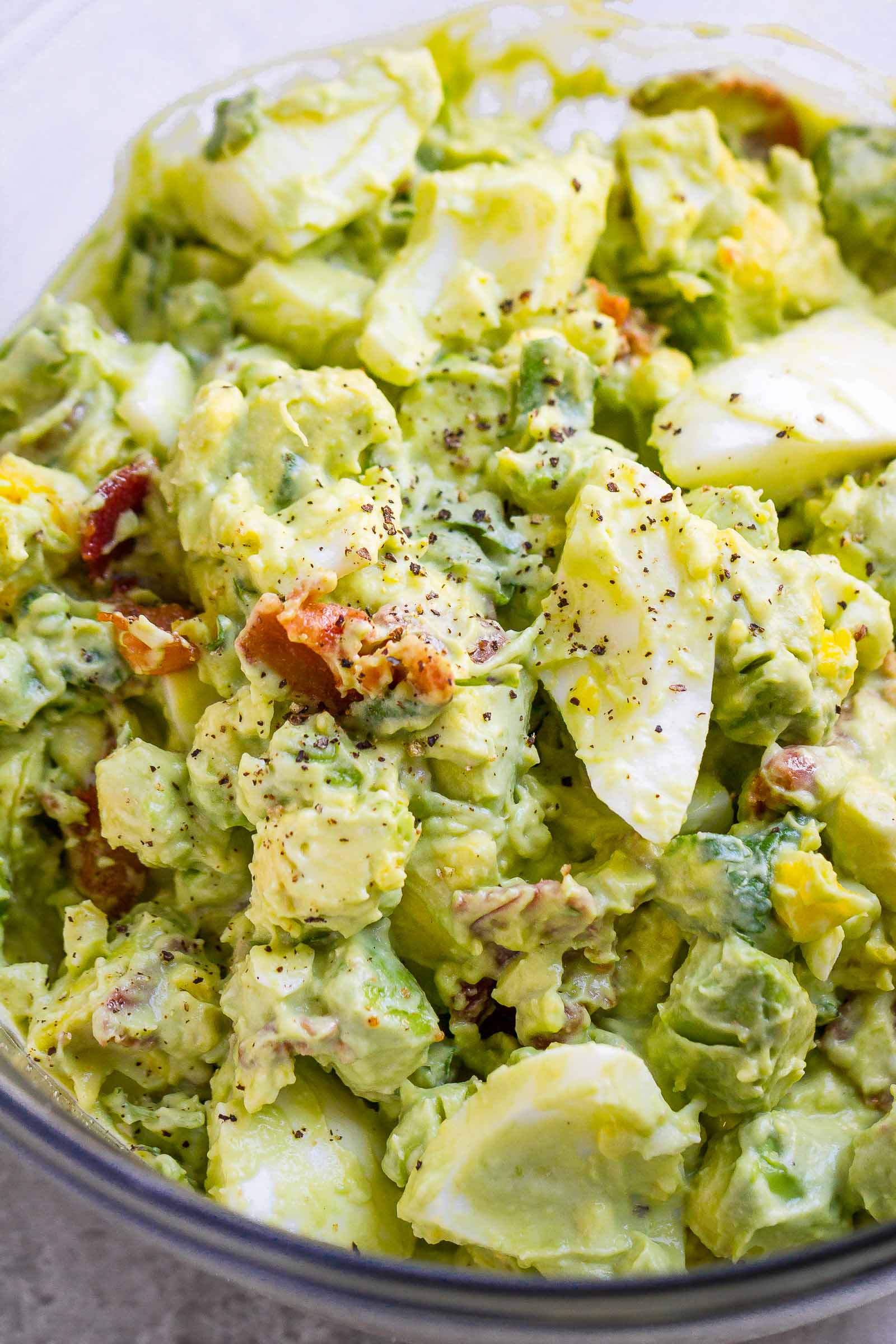 Creamy Avocado Egg Salad with Crispy Bacon – Easy, nutritious, and SO delicious! This chunky avocado egg salad is made with simple ingredients from your pantry.