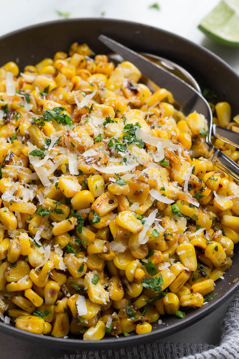 Grilled Corn with Garlic and Parmesan Cheese - Enjoy the addictive flavor of grilled corn anytime you want with this spicy cheesy grilled corn  recipe. 