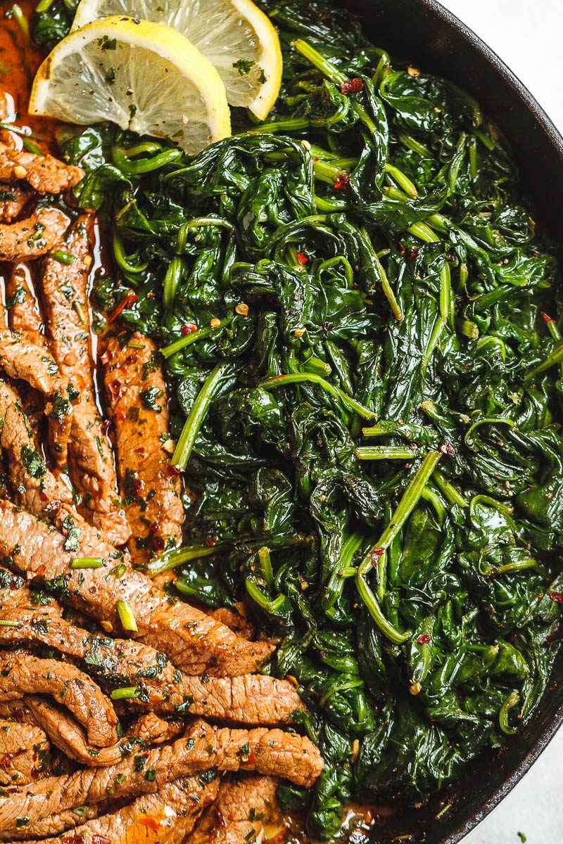 Lemon Garlic Butter Steak and Spinach - Tons of flavor and so easy to make! A quick low carb dinner you’ll be crazy about.