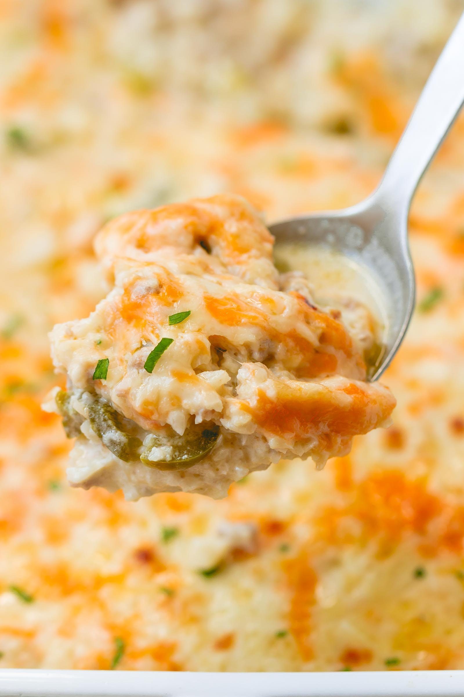 Green Chile Cauliflower Casserole - Warm and addicting comfort food alert! A quick, easy and great for your weekly meal rotation!