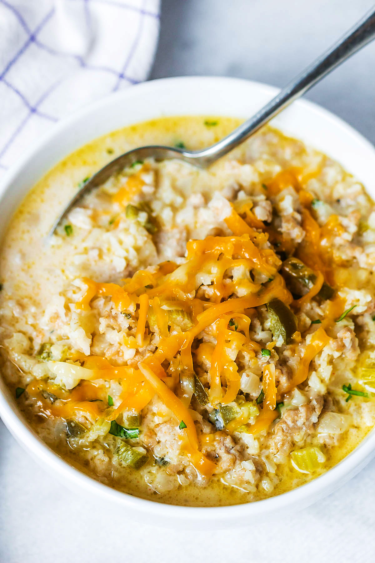 Creamy Cauliflower Rice Chicken Soup - A quick and easy meal that's perfect to warm you up.