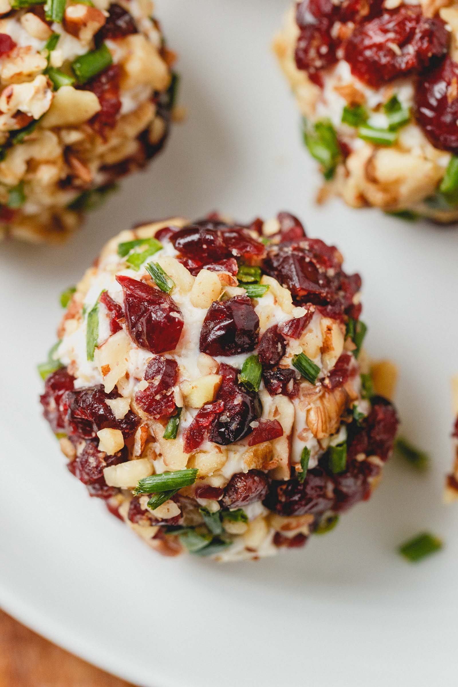 Cranberry Nut Cream Cheese Balls - These super festive cheese balls won't last long on your table - definitely a crowd pleaser!