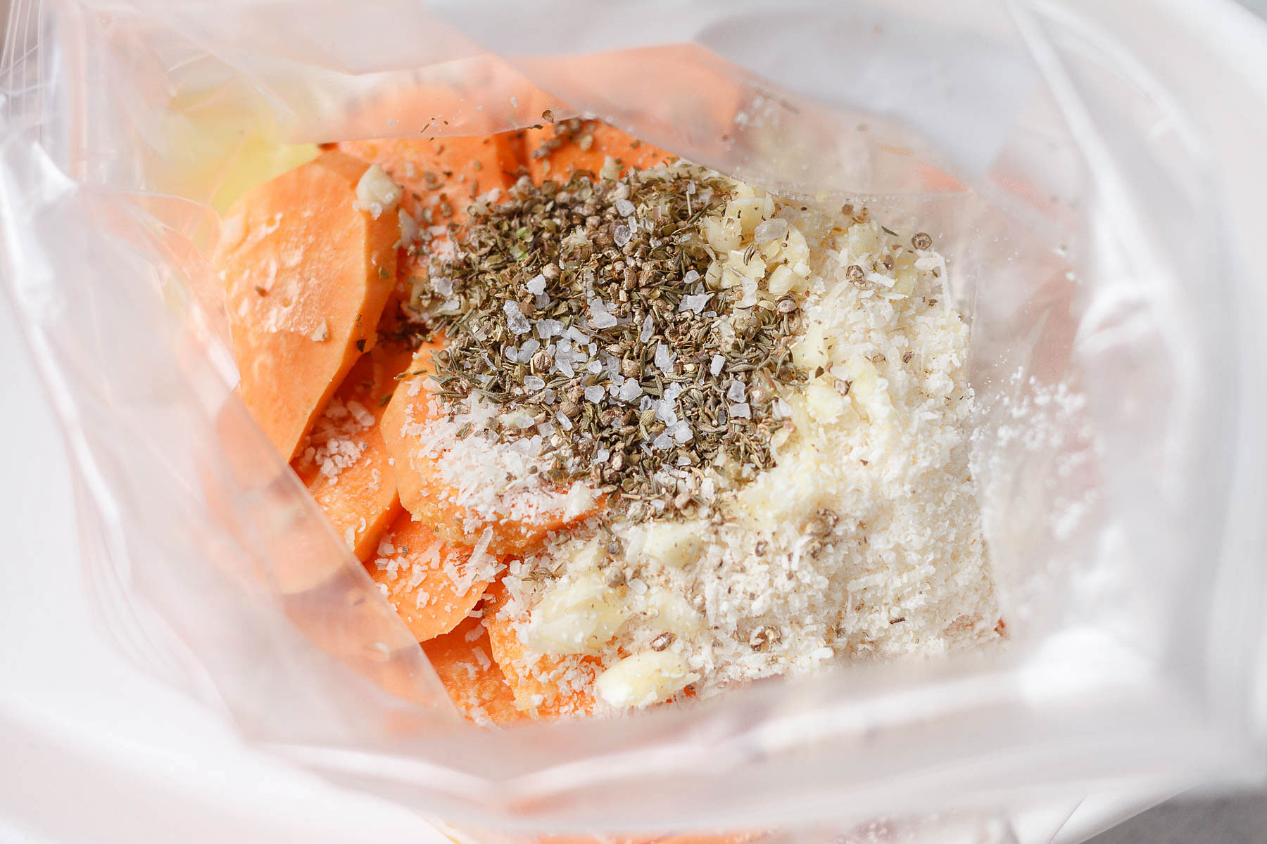 Garlic Parmesan Roasted Sweet Potatoes - #eatwell101 #recipe Tender, extra-flavorful #Roasted Sweet #Potatoes easy to make. 