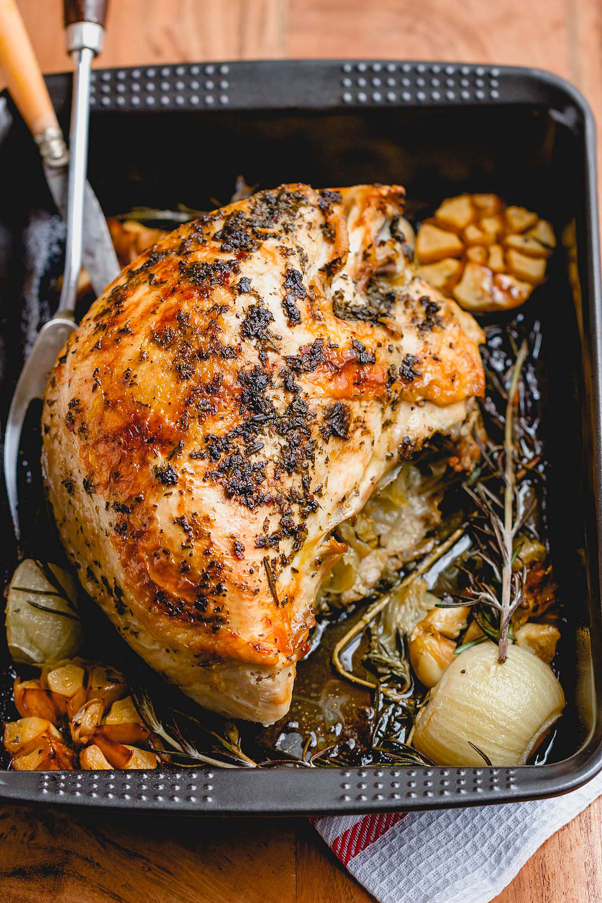 Roasted Turkey Breast with Garlic Herb Butter - An epic Thanksgiving holiday meal loaded with flavor and a super juicy meat. 
