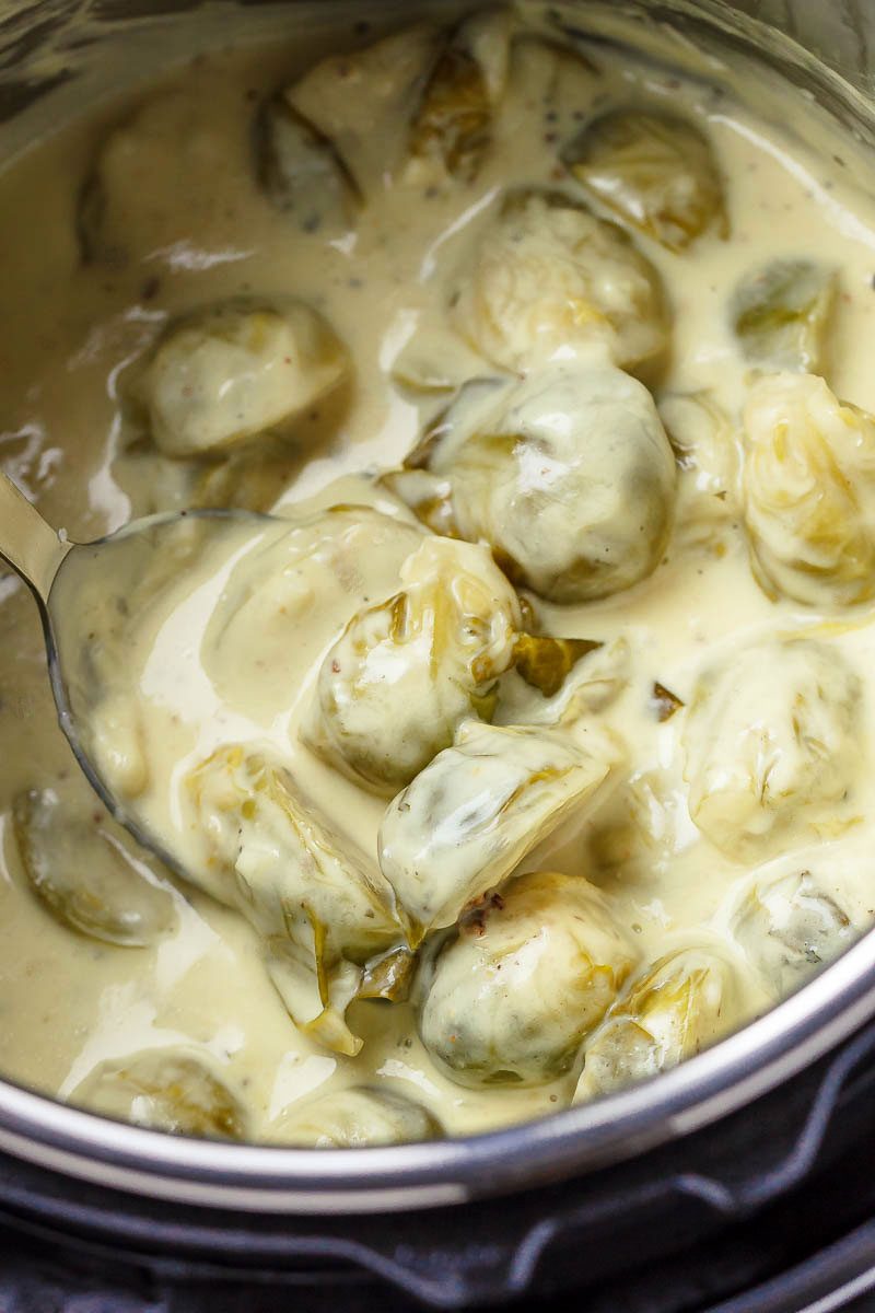 Creamy Instant Pot Brussels Sprouts - #eatwell101 #recipe #keto #lowcarb #glutenfree #vegetarian - Creamy and savory, this side dish with brussels sprouts and bacon is outstanding all on its own!