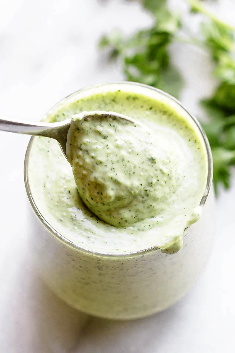 Creamy Cilantro Lime Dressing - Creamy and so fresh, this Cilantro Lime Dressing is guaranteed to brighten up any salad. Cilantro Lime Dressing Recipe, cilantro lime salad dressing, cilantro lime dressing recipe, cilantro lime vinaigrette, creamy cilantro dressing