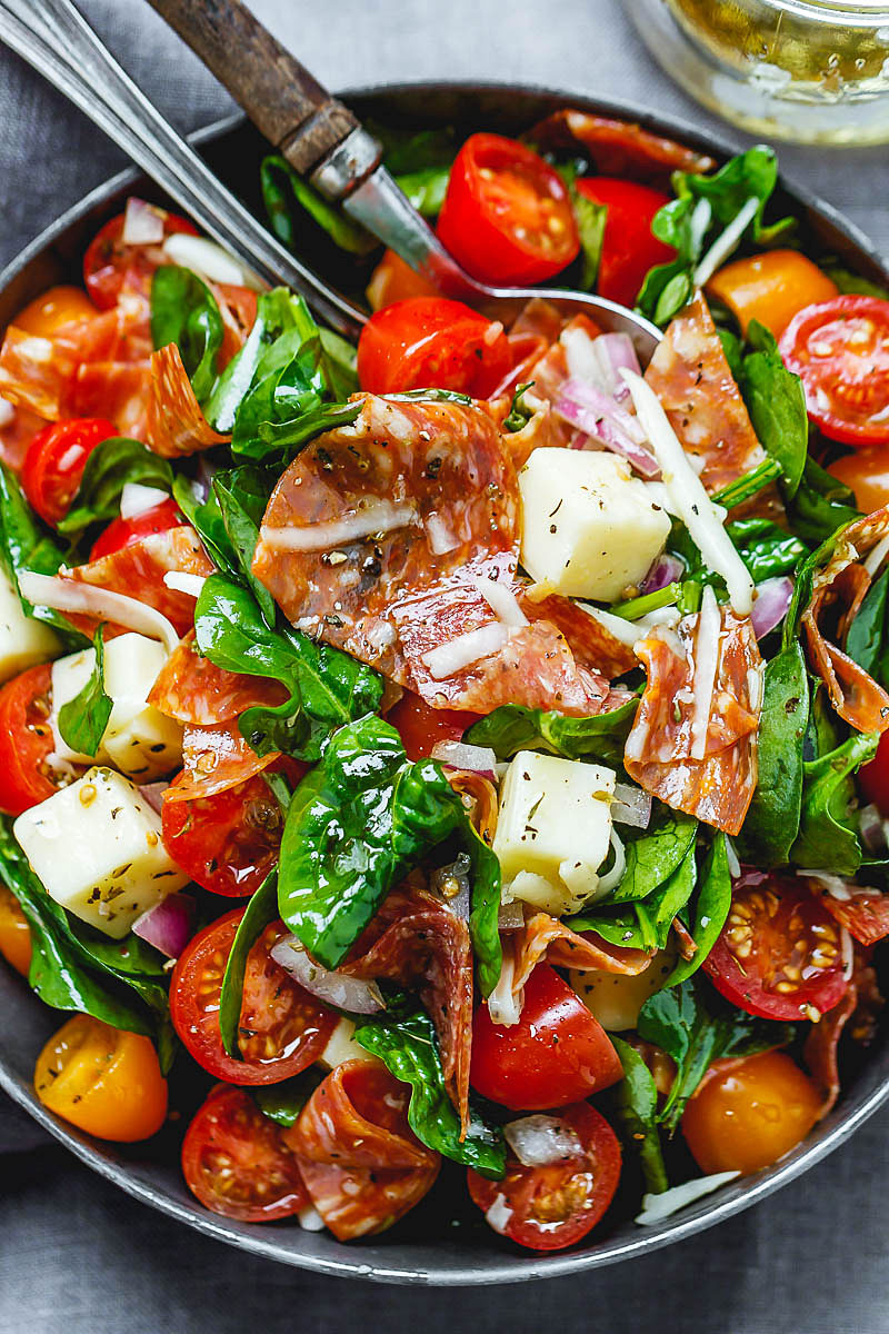 Spinach Salad with Mozzarella, Tomato & Pepperoni - Healthy and delicious, this spinach salad is so simple and perfect for a quick lunch.