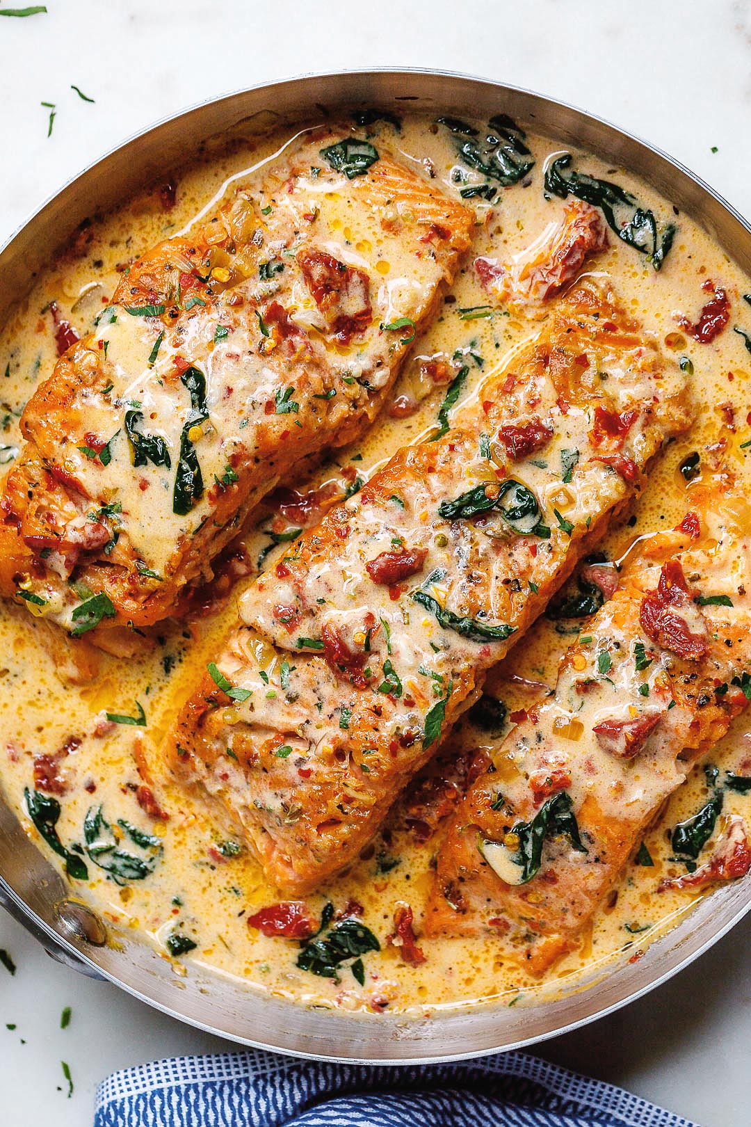 Creamy Garlic Tuscan Salmon With Spinach and Sun-Dried Tomatoes